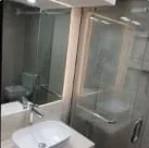Bathroom tiling & glass screens: Full tiling with glass shower screens
